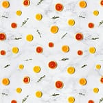 Colorful citrus slices arranged in a flat lay pattern on a marble surface, ideal for backgrounds.
